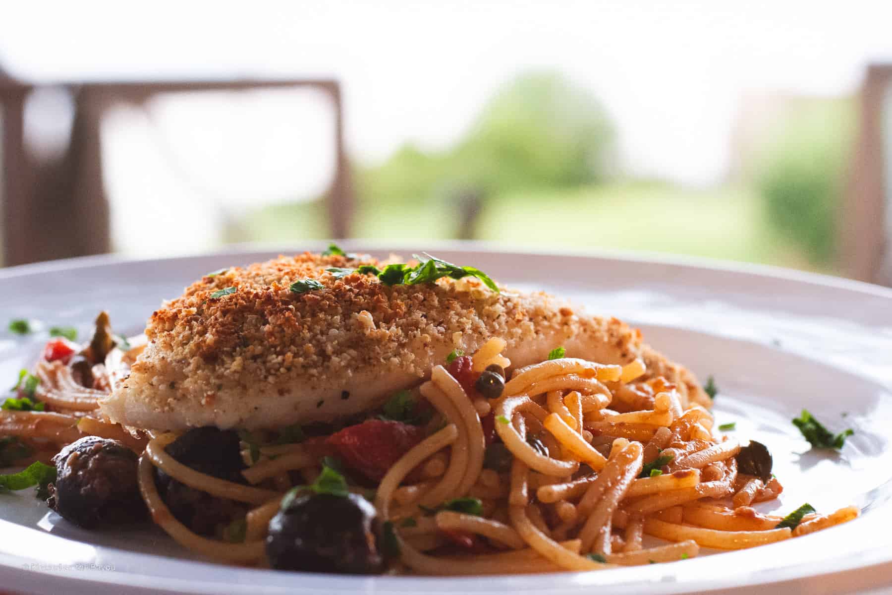 gf red snapper pasta puttanesca plated