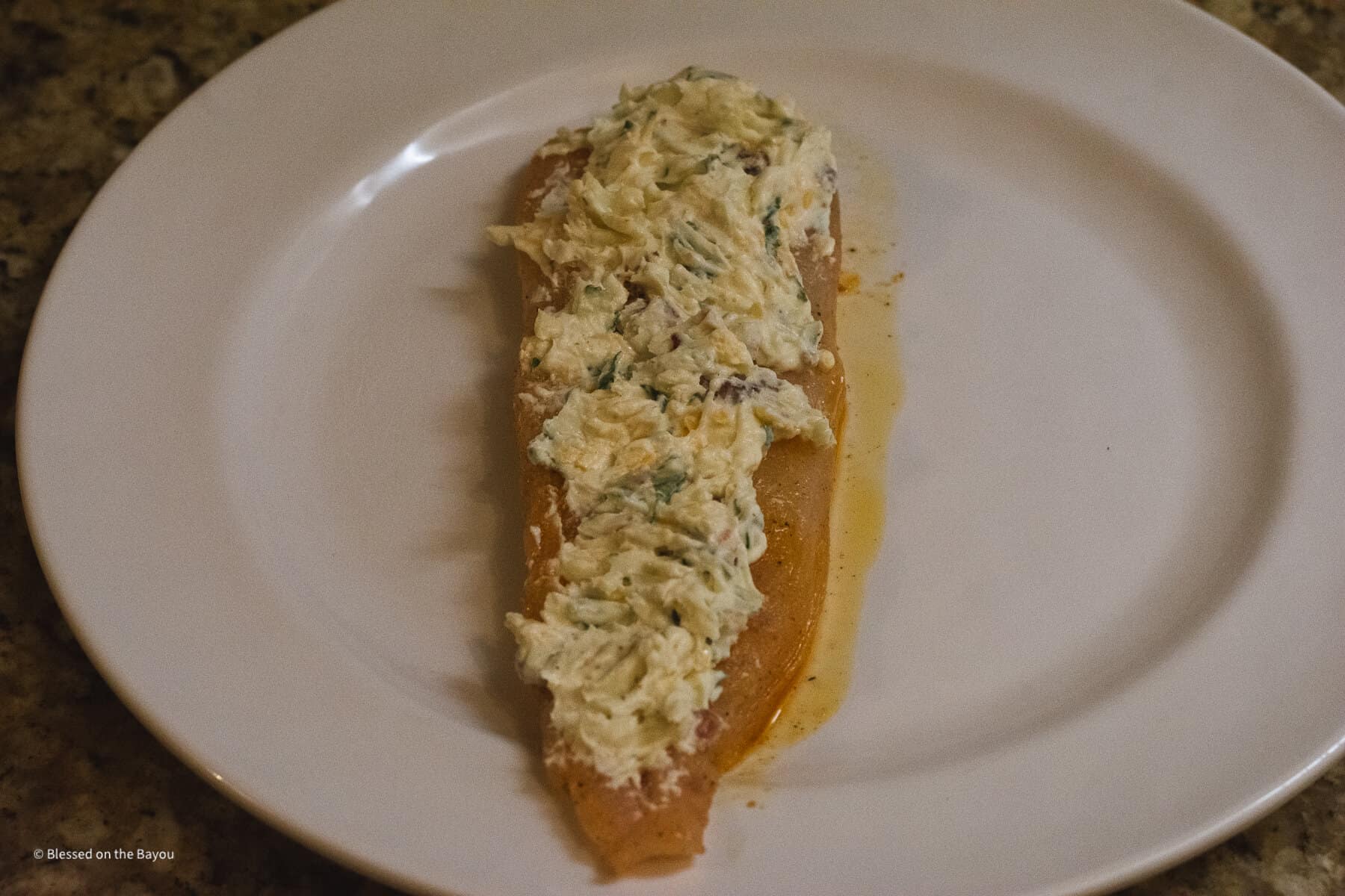 fish filet with stuffing on plate