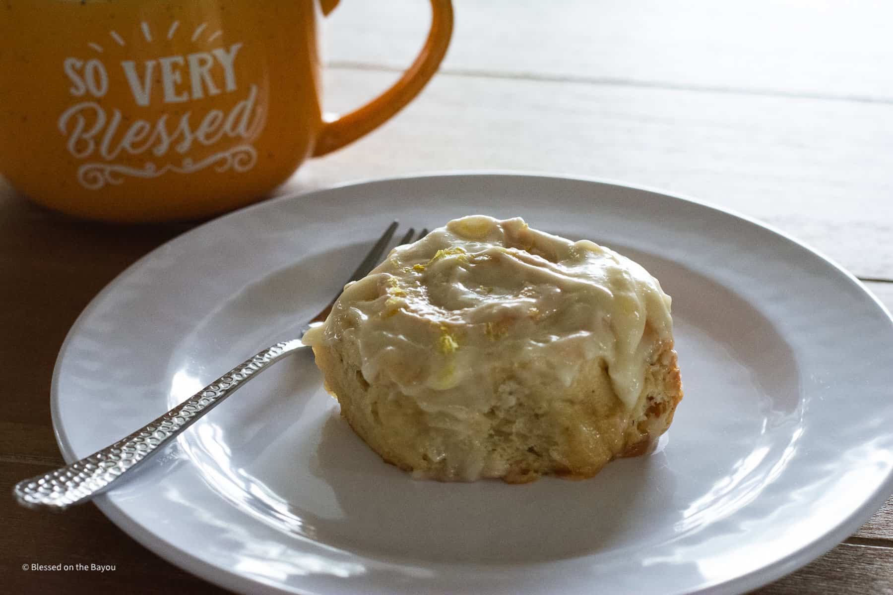Lemon Roll on table with coffee