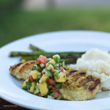 Plated Grilled Wahoo white plate with vegetables