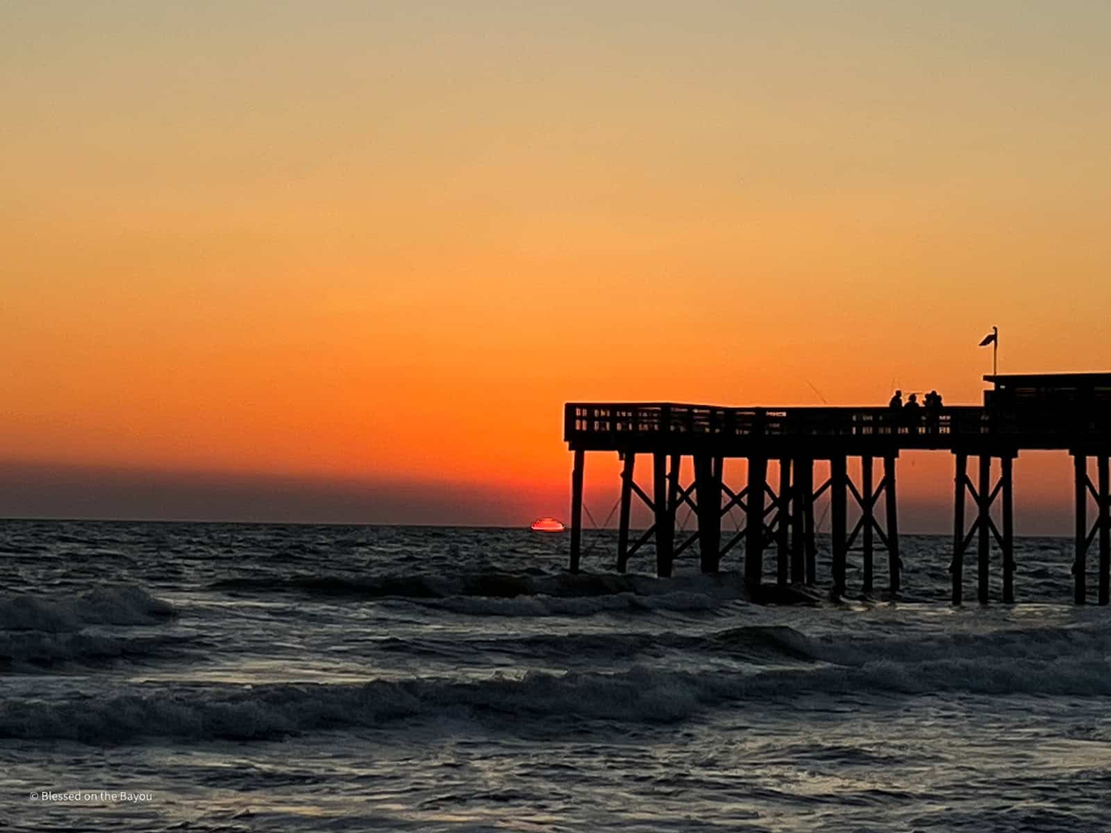 Pier at St. Andrews State Park at sunset