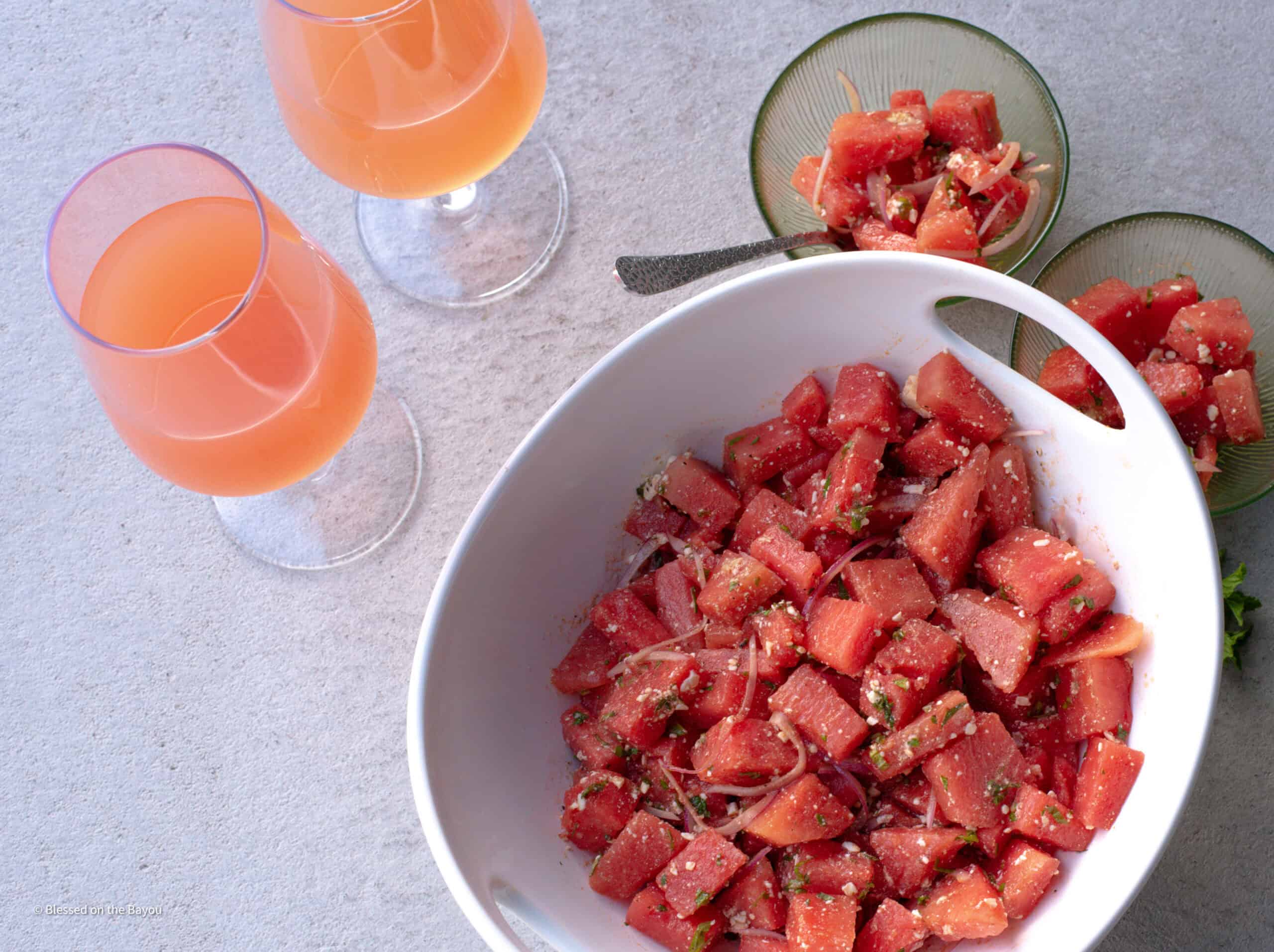 watermelon salad overview two glasses and two bowls