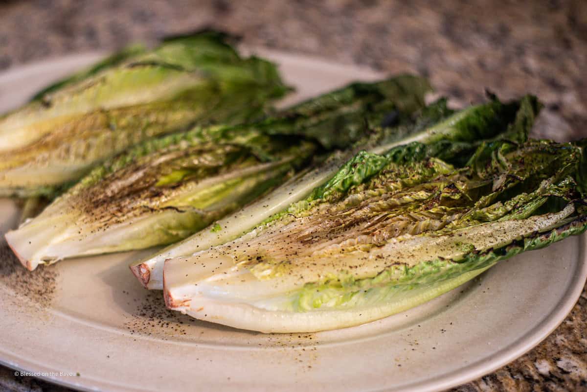 Charred Romaine Lettuce on a platter
