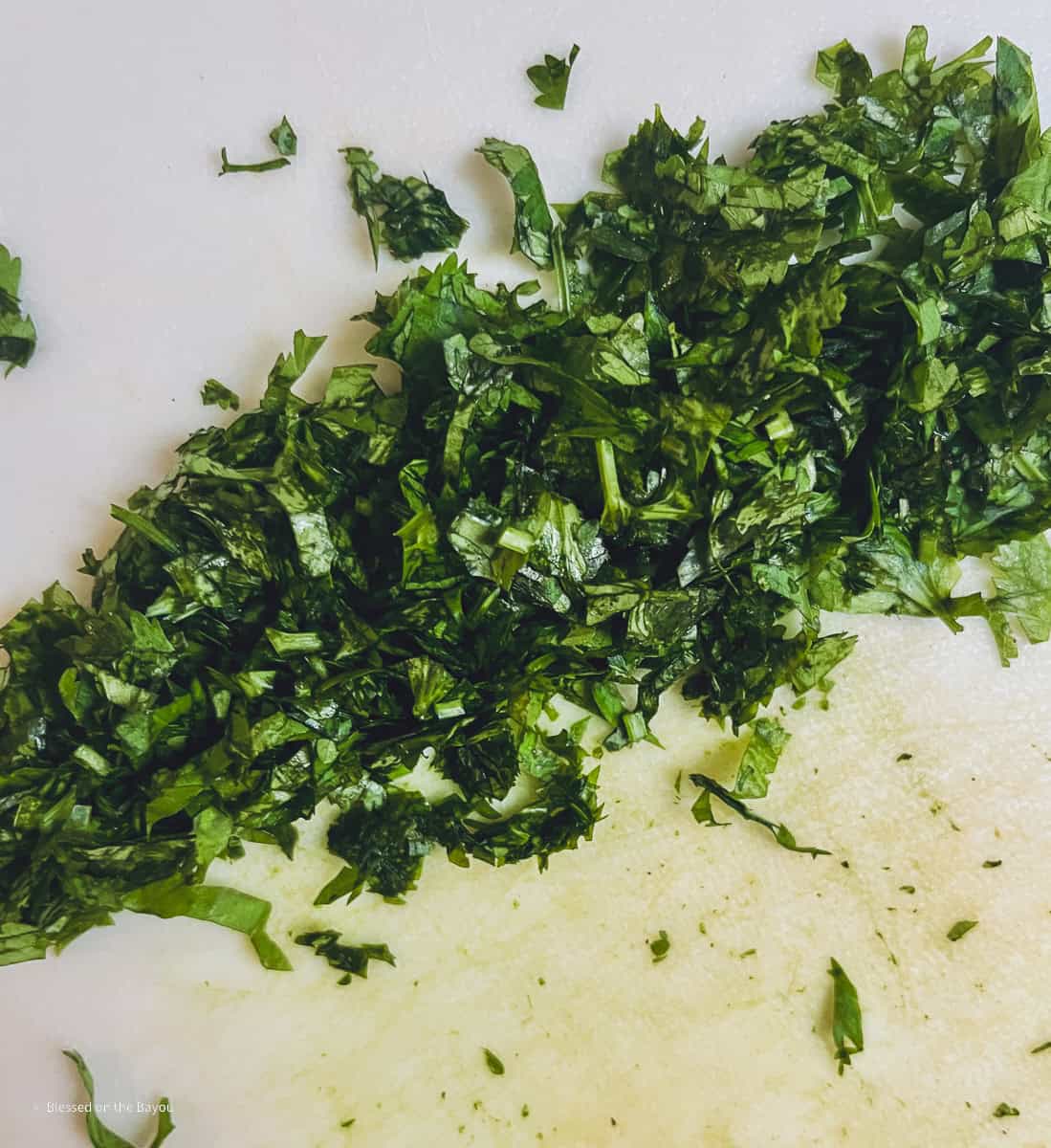 chopped cilantro on a cutting board